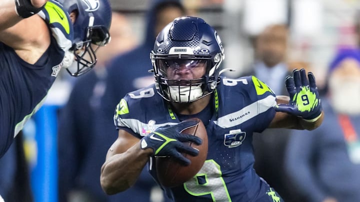 Feb 8, 2026; Santa Clara, CA, USA; Seattle Seahawks running back Kenneth Walker III (9) runs against New England Patriots linebacker Christian Elliss (53) during the third quarter in Super Bowl LX at Levi's Stadium. 