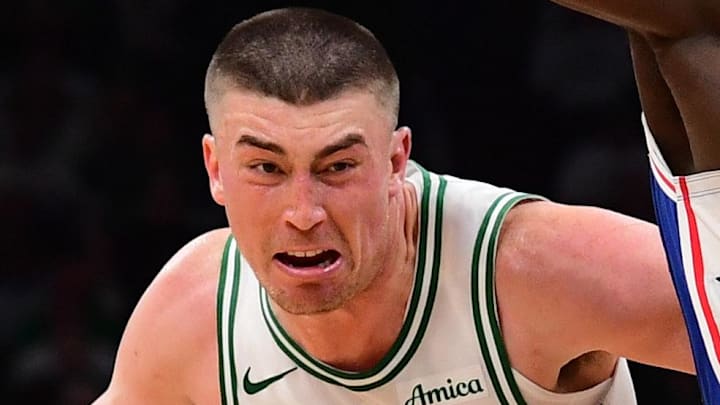 Apr 19, 2026; Boston, Massachusetts, USA; Philadelphia 76ers center Adem Bona (30) defends Boston Celtics guard Payton Pritchard (11) in the second half during game one of the first round of the 2026 NBA Playoffs at TD Garden. Mandatory Credit: Bob DeChiara-Imagn Images