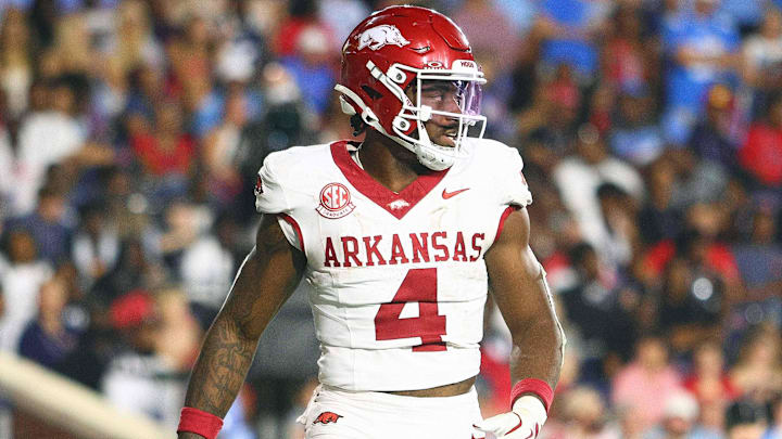 Sep 13, 2025; Oxford, Mississippi, USA; Arkansas Razorback running back Mike Washington Jr. (4) reacts after a touchdown during the fourth quarter against the Mississippi Rebels at Vaught-Hemingway Stadium. 