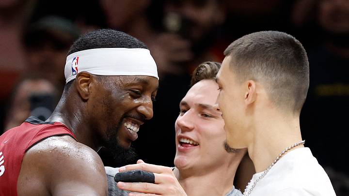 Mar 10, 2026; Miami, Florida, USA; Miami Heat center Bam Adebayo (13) celebrates with guards Pelle Larsson and Tyler Herro after becoming the NBA's second highest scorer of points in a game against the Wshington Wizards at Kaseya Center. Mandatory Credit: Rhona Wise-Imagn Images Mar 10, 2026; Miami, Florida, USA; Miami Heat center Bam Adebayo (13) celebrates with guards Pelle Larsson and Tyler Herro after becoming the NBA's second highest scorer of points in a game against the Wshington Wizards at Kaseya Center. Mandatory Credit: Rhona Wise-Imagn Images