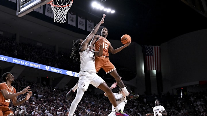 Feb 28, 2026; College Station, Texas, USA; Texas Longhorns guard Tramon Mark (12) shoots the ball as Texas A&M Aggies forward Jamie Vinson (4) defends during the first half at Reed Arena. Mandatory Credit: Maria Lysaker-Imagn Images Feb 28, 2026; College Station, Texas, USA; Texas Longhorns guard Tramon Mark (12) shoots the ball as Texas A&M Aggies forward Jamie Vinson (4) defends during the first half at Reed Arena. Mandatory Credit: Maria Lysaker-Imagn Images