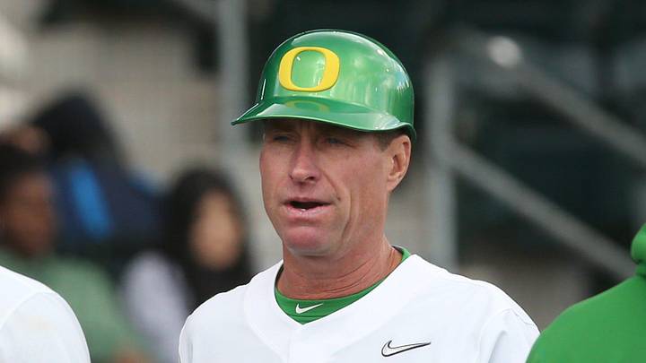 Oregon baseball coach Mark Wasikowski, center, plots strategy as the Ducks take San Francisco to extra innings at PK Park March 30, 2022.