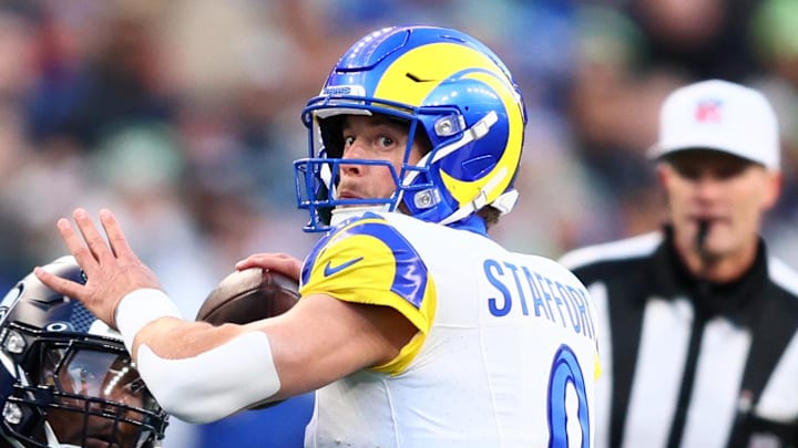 Jan 25, 2026; Seattle, WA, USA; Los Angeles Rams quarterback Matthew Stafford (9) passes against Seattle Seahawks defensive end DeMarcus Lawrence (0) during the first half in the 2026 NFC Championship Game at Lumen Field. Mandatory Credit: Kevin Ng-Imagn Images Jan 25, 2026; Seattle, WA, USA; Los Angeles Rams quarterback Matthew Stafford (9) passes against Seattle Seahawks defensive end DeMarcus Lawrence (0) during the first half in the 2026 NFC Championship Game at Lumen Field. Mandatory Credit: Kevin Ng-Imagn Images