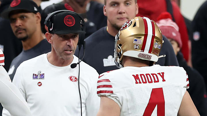 San Francisco 49ers head coach Kyle Shanahan (L) and kicker Jake Moody (R)