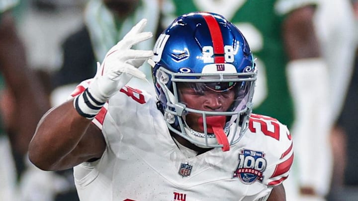 New York Giants running back Jacob Saylors (28).