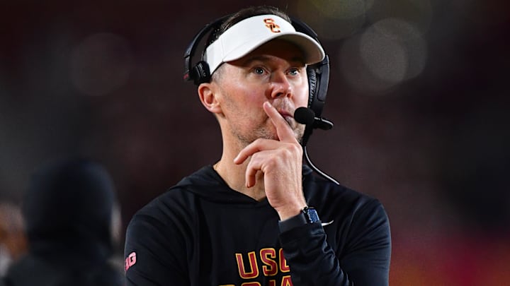Nov 7, 2025; Los Angeles, California, USA; Southern California Trojans head coach Lincoln Riley watches game action against the Northwestern Wildcats during the second half at the Los Angeles Memorial Coliseum. Mandatory Credit: Gary A. Vasquez-Imagn Images