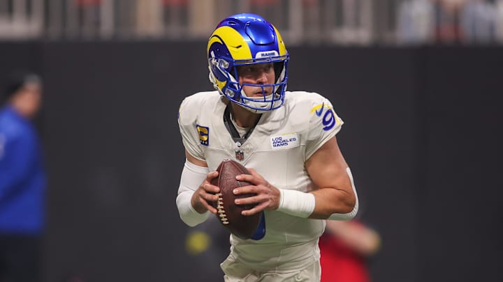 Dec 29, 2025; Atlanta, Georgia, USA; Los Angeles Rams quarterback Matthew Stafford (9) drops back to pass against the Atlanta Falcons in the first quarter at Mercedes-Benz Stadium. Mandatory Credit: Brett Davis-Imagn Images