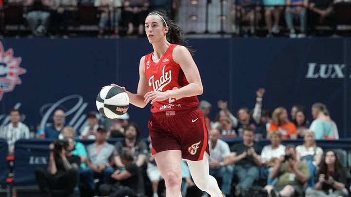 Jun 13, 2026; Uncasville, Connecticut, USA; Indiana Fever guard Caitlin Clark (22) dribbles the ball up the court against the Connecticut Sun during the second half at Mohegan Sun Arena. Mandatory Credit: Gregory Fisher-Imagn Images