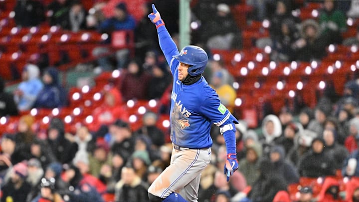 Apr 8, 2025; Boston, Massachusetts, USA; Toronto Blue Jays right fielder George Springer (4) runs threw bases after hitting a home run against the Boston Red Sox during the sixth inning at Fenway Park. 