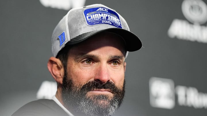 Dec 6, 2025; Charlotte, NC, USA; Duke Blue Devils head coach Manny Diaz looks on after the game against the Virginia Cavaliers during the 2025 ACC Championship game at Bank of America Stadium. Mandatory Credit: Jim Dedmon-Imagn Images