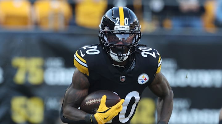 Nov 2, 2025; Pittsburgh, Pennsylvania, USA;  Pittsburgh Steelers running back Kaleb Johnson (20) runs the ball against Indianapolis Colts cornerback Mekhi Blackmon (29) during the third quarter at Acrisure Stadium. Mandatory Credit: Charles LeClaire-Imagn Images