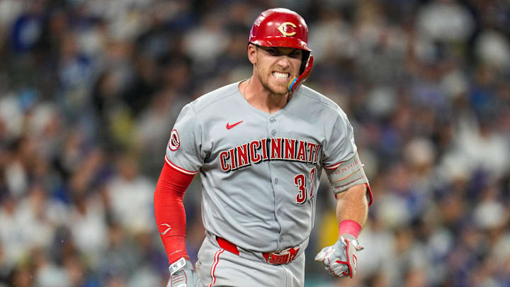 Cincinnati Reds catcher Tyler Stephenson (37) grits his teeth after hitting in a sacrifice fly, scoring Austin Hayes in the eighth inning of the MLB National League Wild Card Game 2 between the Los Angeles Dodgers and the Cincinnati Reds at Dodger Stadium in Los Angeles on Wednesday, Oct. 1, 2025. The Reds were eliminated from the postseason with an 8-4 loss to the reining World Series Champions La Dodgers.