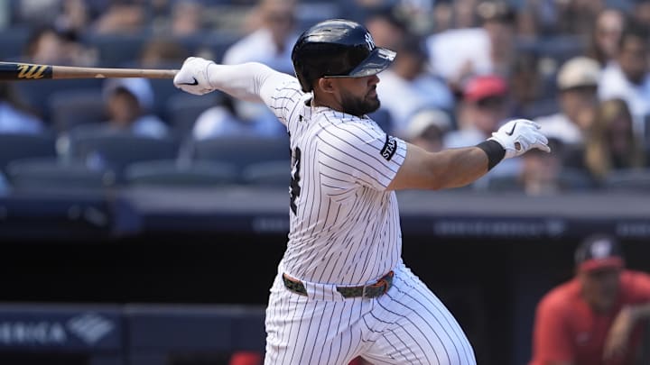 Aug 27, 2025; Bronx, New York, USA; New York Yankees left fielder Jasson Dominguez (24) hits an infield single against the Washington Nationals during the third inning at Yankee Stadium. Mandatory Credit: Gregory Fisher-Imagn Images Aug 27, 2025; Bronx, New York, USA; New York Yankees left fielder Jasson Dominguez (24) hits an infield single against the Washington Nationals during the third inning at Yankee Stadium. Mandatory Credit: Gregory Fisher-Imagn Images