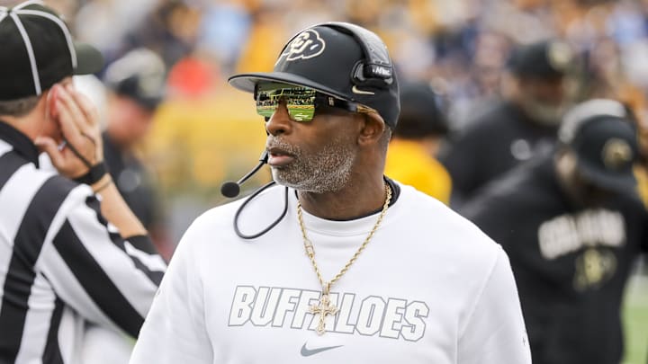 Nov 8, 2025; Morgantown, West Virginia, USA; Colorado Buffaloes head coach Deion Sanders walks along the sidelines late in the fourth quarter against the West Virginia Mountaineers at Milan Puskar Stadium.