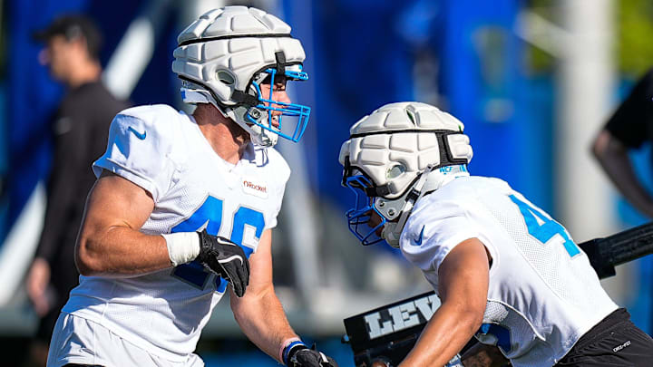 Detroit Lions linebacker Jack Campbell (46), left, and linebacker DaRon Gilbert (43) practice during training camp 