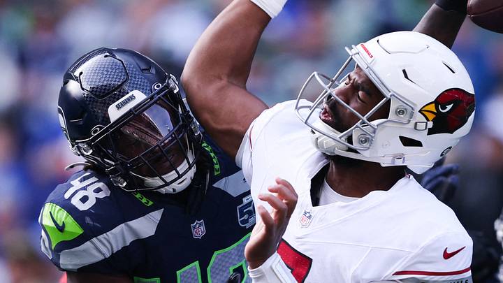 Arizona Cardinals quarterback Jacoby Brissett fumbles the ball as Seattle Seahawks linebacker Tyrice Knight defends. Arizona Cardinals quarterback Jacoby Brissett fumbles the ball as Seattle Seahawks linebacker Tyrice Knight defends.