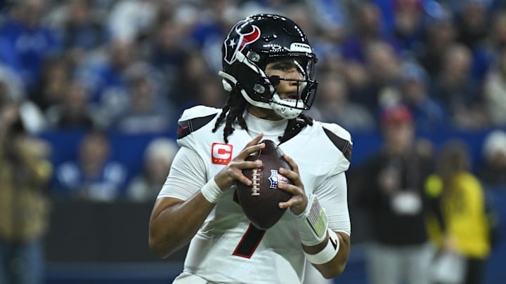 Nov 30, 2025; Indianapolis, Indiana, USA; Houston Texans quarterback C.J. Stroud (7) drops to throw during the first half against the Indianapolis Colts at Lucas Oil Stadium. Mandatory Credit: Robert Goddin-Imagn Images