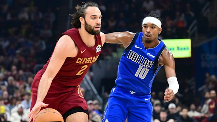 Mar 15, 2026; Cleveland, Ohio, USA; Cleveland Cavaliers guard Max Strus (2) drives to the basket against Dallas Mavericks guard Brandon Williams (10) during the second half at Rocket Arena. Mandatory Credit: Ken Blaze-Imagn Images