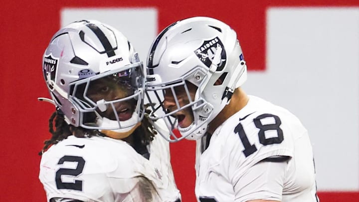 Dec 21, 2025; Houston, Texas, USA; Las Vegas Raiders running back Ashton Jeanty (2) celebrates with wide receiver Jack Bech (18) after catching a touchdown pass against the Houston Texans during the third quarter at NRG Stadium. Mandatory Credit: Thomas Shea-Imagn Images