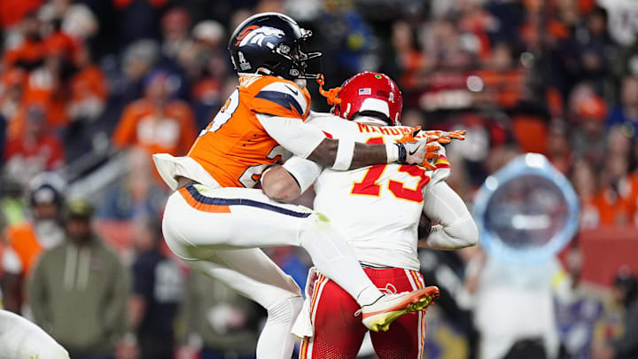Nov 16, 2025; Denver, Colorado, USA; Denver Broncos cornerback Ja'Quan McMillian (29) sacks Kansas City Chiefs quarterback Patrick Mahomes (15) in the fourth quarter at Empower Field at Mile High. Mandatory Credit: Ron Chenoy-Imagn Images Nov 16, 2025; Denver, Colorado, USA; Denver Broncos cornerback Ja'Quan McMillian (29) sacks Kansas City Chiefs quarterback Patrick Mahomes (15) in the fourth quarter at Empower Field at Mile High. Mandatory Credit: Ron Chenoy-Imagn Images