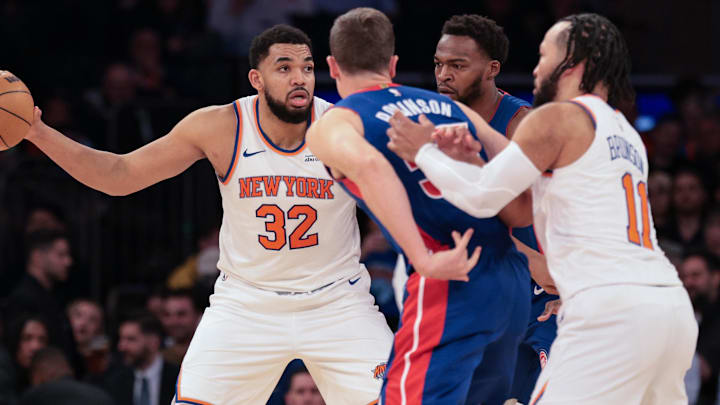 Feb 19, 2026; New York, New York, USA; New York Knicks center Karl-Anthony Towns (32) looks to pass during the second half against the Detroit Pistons at Madison Square Garden. Mandatory Credit: Vincent Carchietta-Imagn Images