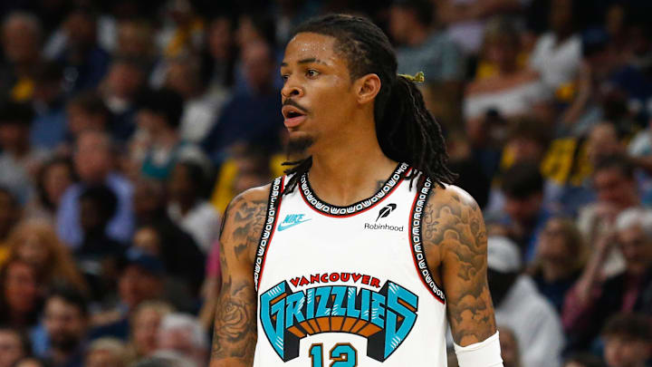 Apr 18, 2025; Memphis, Tennessee, USA; Memphis Grizzlies guard Ja Morant (12) looks on during the second quarter against the Dallas Mavericks at FedExForum. Mandatory Credit: Petre Thomas-Imagn Images