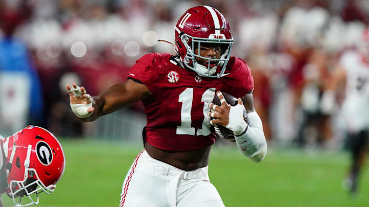 Sep 28, 2024; Tuscaloosa, Alabama, USA; Alabama Crimson Tide linebacker Jihaad Campbell (11) returns an interception against Georgia Bulldogs wide receiver Dillon Bell (86) during the first half at Bryant-Denny Stadium. Mandatory Credit: John David Mercer-Imagn Images Sep 28, 2024; Tuscaloosa, Alabama, USA; Alabama Crimson Tide linebacker Jihaad Campbell (11) returns an interception against Georgia Bulldogs wide receiver Dillon Bell (86) during the first half at Bryant-Denny Stadium. Mandatory Credit: John David Mercer-Imagn Images
