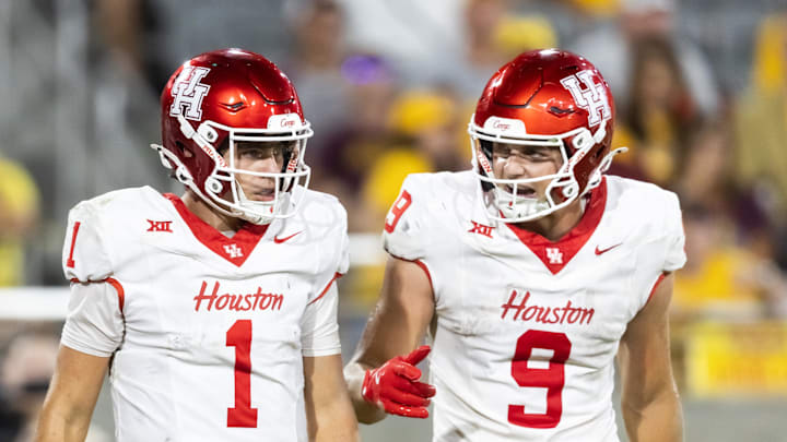 Oct 25, 2025; Tempe, Arizona, USA; Houston Cougars quarterback Conner Weigman (1) and tight end Tanner Koziol (9) against the Arizona State Sun Devils at Mountain America Stadium. Mandatory Credit: Mark J. Rebilas-Imagn Images