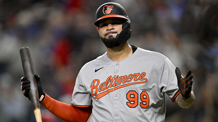Jun 30, 2025; Arlington, Texas, USA; Baltimore Orioles designated hitter Gary Sanchez (99) reacts to striking out to end the inning against the Texas Rangers during the seventh inning at Globe Life Field