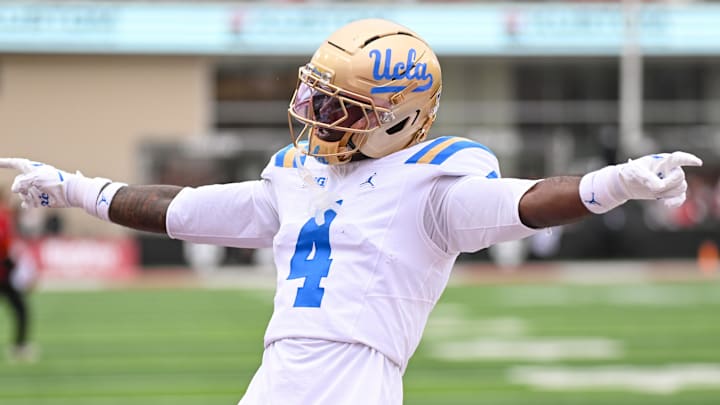 Oct 25, 2025; Bloomington, Indiana, USA; UCLA Bruins defensive back Key Lawrence (4) celebrates after a play during the first half against the Indiana Hoosiers at Memorial Stadium. Mandatory Credit: Robert Goddin-Imagn Images