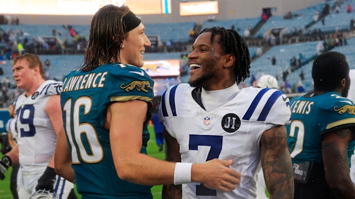 Jacksonville Jaguars quarterback Trevor Lawrence (16) greets Indianapolis Colts cornerback Charvarius Ward (7) after the game of an NFL football game at EverBank Stadium, Sunday, Dec. 7, 2025, in Jacksonville, Fla. The Jaguars defeated the Colts 36-19.