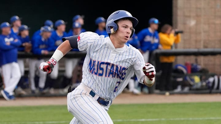Fort Cobb-Broxton's Eli Willits runs to first after hitting a fly ball during the high school baseball game between Fort Cobb-Broxton and Stillwater at Edmond Santa Fe High School in Edmond, Okla., Friday, April, 18, 2025.