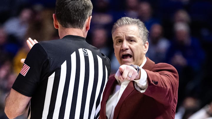 Arkansas Razorbacks coach John Calipari points a foul out to the referee against the LSU Tigers during the second half at Pete Maravich Assembly Center.