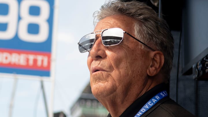 Mario Andretti looks out on the track Friday, May 17, 2024, during Fast Friday ahead of the 108th running of the Indianapolis 500 at Indianapolis Motor Speedway.