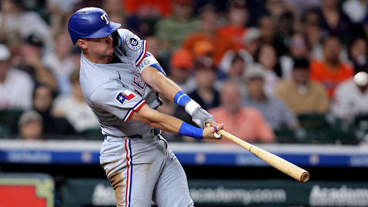 Texas Rangers third baseman Josh Jung (6) hits a two run home run to left field against the Houston Astros during the fifth inning at Daikin Park. Texas Rangers third baseman Josh Jung (6) hits a two run home run to left field against the Houston Astros during the fifth inning at Daikin Park.