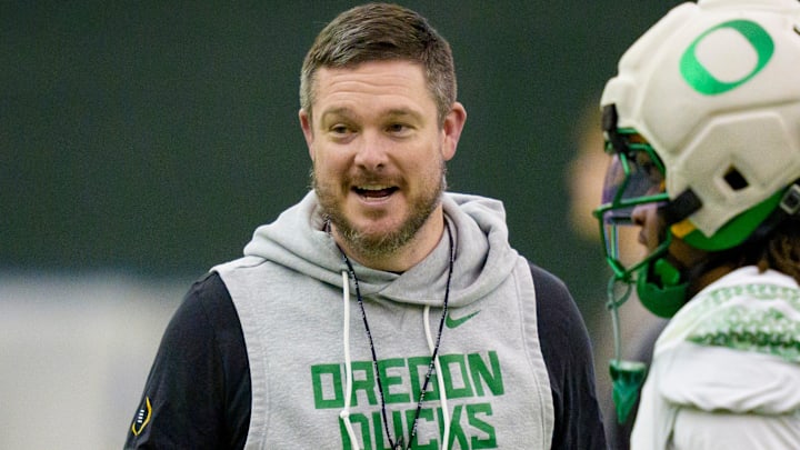 Oregon head coach Dan Lanning walks the field during an open practice ahead of the Orange Bowl at the Moshofsky Center in Eugene, Oregon on Dec. 27, 2025.