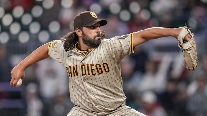Apr 9, 2023; Cumberland, Georgia, USA; San Diego Padres relief pitcher Nabil Crismatt (74) pitches against the Atlanta Braves during the ninth inning at Truist Park. Mandatory Credit: Dale Zanine-Imagn Images
