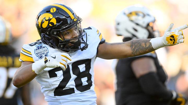 Dec 30, 2024; Nashville, TN, USA; Iowa Hawkeyes running back Kamari Moulton (28) celebrates his first down against the Missouri Tigers during the first half at Nissan Stadium. Mandatory Credit: Steve Roberts-Imagn Images Dec 30, 2024; Nashville, TN, USA; Iowa Hawkeyes running back Kamari Moulton (28) celebrates his first down against the Missouri Tigers during the first half at Nissan Stadium. Mandatory Credit: Steve Roberts-Imagn Images