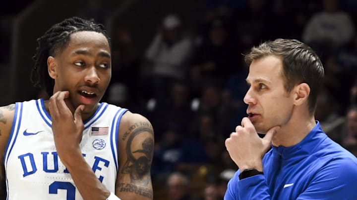Jan 24, 2026; Durham, North Carolina, USA; Duke Blue Devils head coach Jon Scheyer (right) talks to forward Isaiah Evans (3) during the second half against the Wake Forest Demon Deacons at Cameron Indoor Stadium. Mandatory Credit: Rob Kinnan-Imagn Images Jan 24, 2026; Durham, North Carolina, USA; Duke Blue Devils head coach Jon Scheyer (right) talks to forward Isaiah Evans (3) during the second half against the Wake Forest Demon Deacons at Cameron Indoor Stadium. Mandatory Credit: Rob Kinnan-Imagn Images