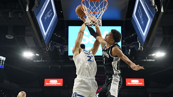 Nov 2, 2024; San Antonio, Texas, USA; San Antonio Spurs center Victor Wembanyama (1) blocks the shot attempted by Minnesota Timberwolves center Rudy Gobert (27) during the first half at Frost Bank Center.