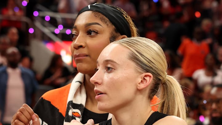 Team Collier guard Paige Bueckers and Team Collier forward Angel Reese.