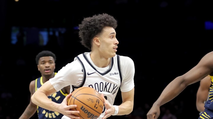 Feb 11, 2026; Brooklyn, New York, USA; Brooklyn Nets guard Nolan Traore (88) drives to the basket against Indiana Pacers guard Kobe Brown (24) during the first quarter at Barclays Center. Mandatory Credit: Brad Penner-Imagn Images