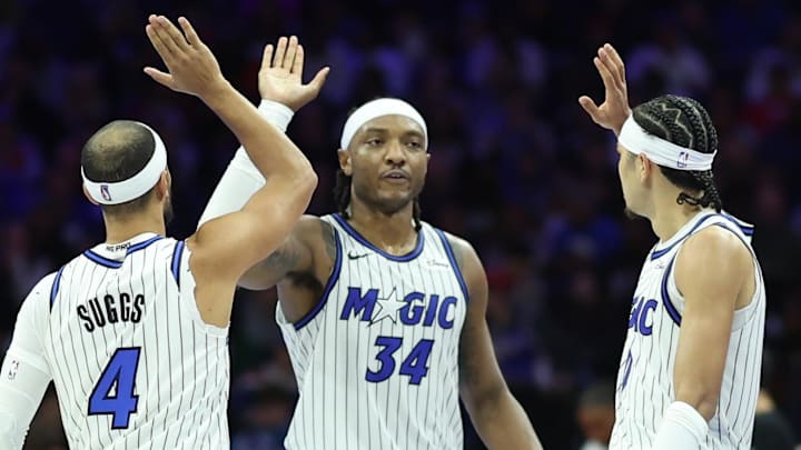 Nov 25, 2025; Philadelphia, Pennsylvania, USA; Orlando Magic guard Anthony Black (0) and center Wendell Carter Jr. (34) and guard Jalen Suggs (4) high five after a play against the Philadelphia 76ers during the second quarter at Xfinity Mobile Arena. Mandatory Credit: Bill Streicher-Imagn Images Nov 25, 2025; Philadelphia, Pennsylvania, USA; Orlando Magic guard Anthony Black (0) and center Wendell Carter Jr. (34) and guard Jalen Suggs (4) high five after a play against the Philadelphia 76ers during the second quarter at Xfinity Mobile Arena. Mandatory Credit: Bill Streicher-Imagn Images
