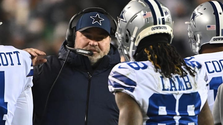 Dallas Cowboys head coach Mike McCarthy celebrates with wide receiver CeeDee Lamb.