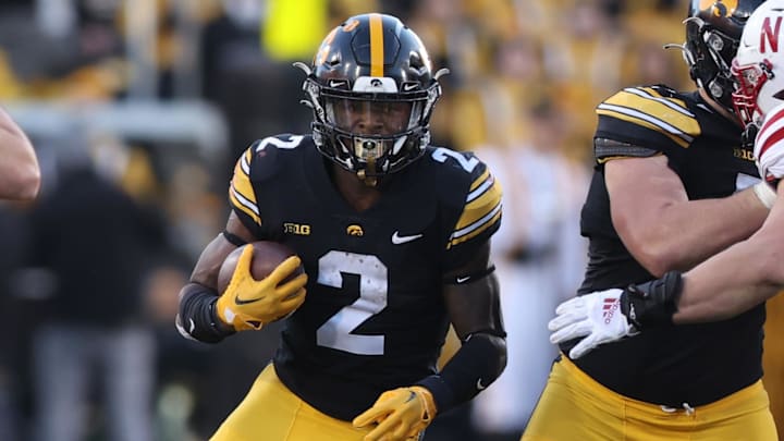 Nov 25, 2022; Iowa City, Iowa, USA; Iowa Hawkeyes running back Kaleb Johnson (2) runs the ball against the Nebraska Cornhuskers at Kinnick Stadium. Mandatory Credit: Reese Strickland-Imagn Images Nov 25, 2022; Iowa City, Iowa, USA; Iowa Hawkeyes running back Kaleb Johnson (2) runs the ball against the Nebraska Cornhuskers at Kinnick Stadium. Mandatory Credit: Reese Strickland-Imagn Images