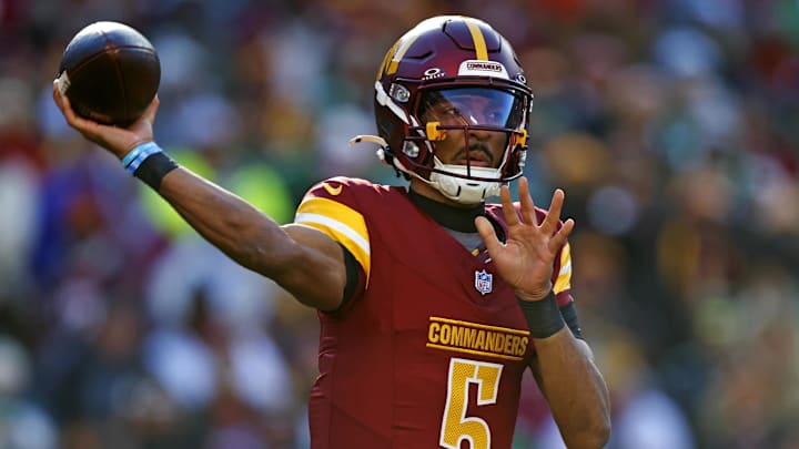 Dec 22, 2024; Landover, Maryland, USA; Washington Commanders quarterback Jayden Daniels (5) throws a pass during the first quarter against the Philadelphia Eagles at Northwest Stadium. Mandatory Credit: Peter Casey-Imagn Images Dec 22, 2024; Landover, Maryland, USA; Washington Commanders quarterback Jayden Daniels (5) throws a pass during the first quarter against the Philadelphia Eagles at Northwest Stadium. Mandatory Credit: Peter Casey-Imagn Images