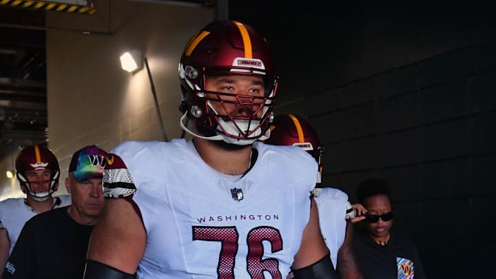 Oct 1, 2023; Philadelphia, Pennsylvania, USA; Washington Commanders offensive tackle Sam Cosmi (76) leads his team in the tunnel against the Philadelphia Eagles at Lincoln Financial Field. Mandatory Credit: Eric Hartline-Imagn Images Oct 1, 2023; Philadelphia, Pennsylvania, USA; Washington Commanders offensive tackle Sam Cosmi (76) leads his team in the tunnel against the Philadelphia Eagles at Lincoln Financial Field. Mandatory Credit: Eric Hartline-Imagn Images