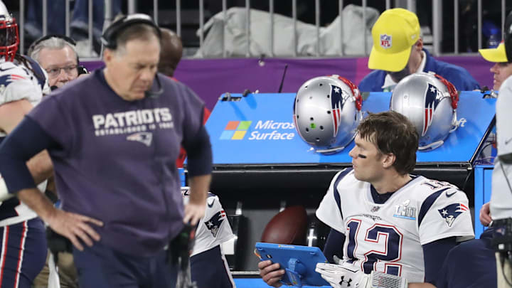 Belichick walks past Brady during Super Bowl LII.