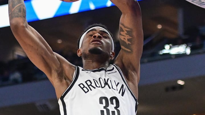 Mar 21, 2024; Milwaukee, Wisconsin, USA; Brooklyn Nets center Nicolas Claxton (33) dunks the ball in the third quarter against the Milwaukee Bucks at Fiserv Forum. Mandatory Credit: Benny Sieu-Imagn Images
