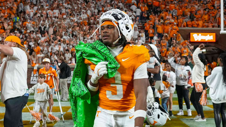 Tennessee defensive back Jermod McCoy carries a deflated gator after defeating Florida at Neyland Stadium